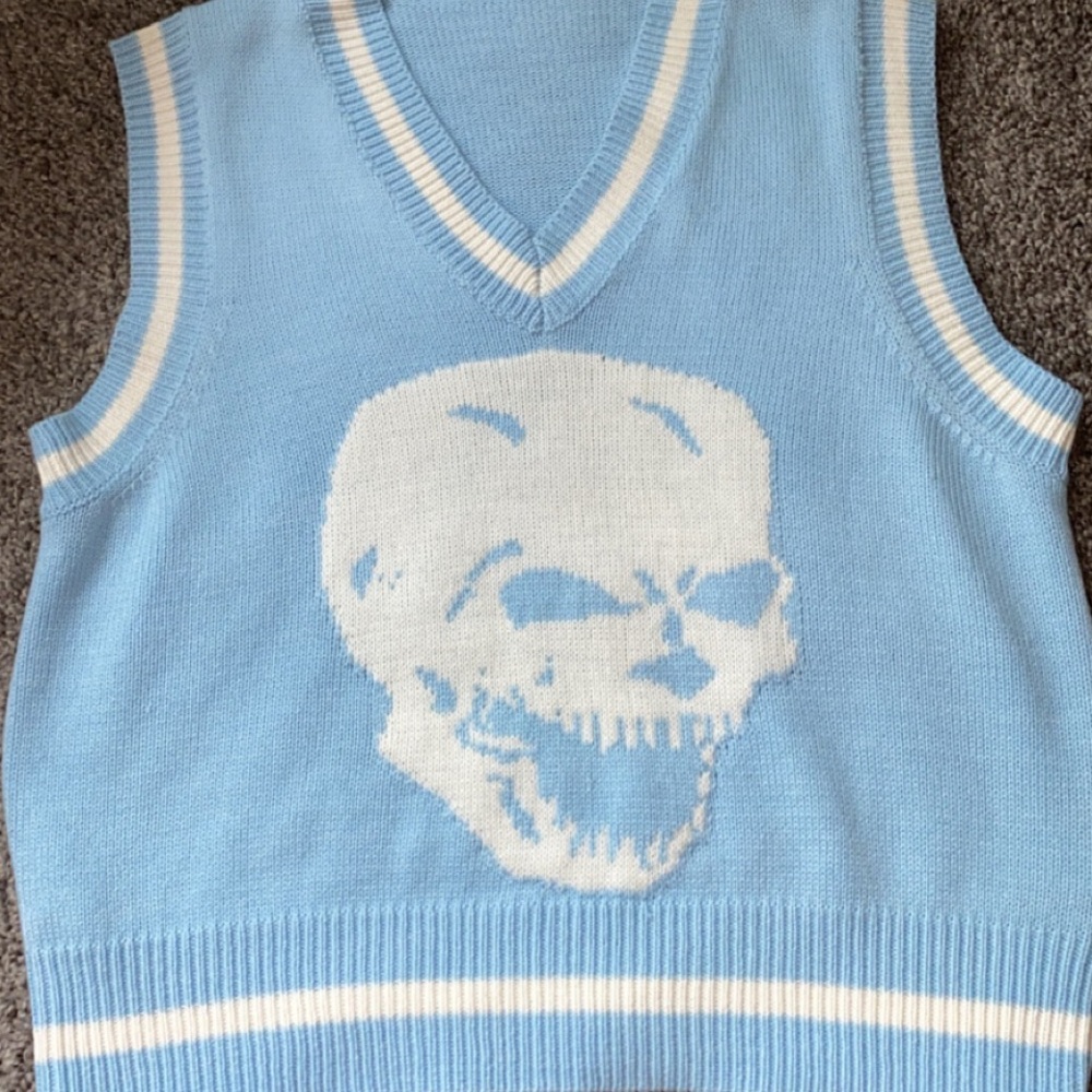 I’m selling a medium light blue skull sweater, this sweater is from shein.